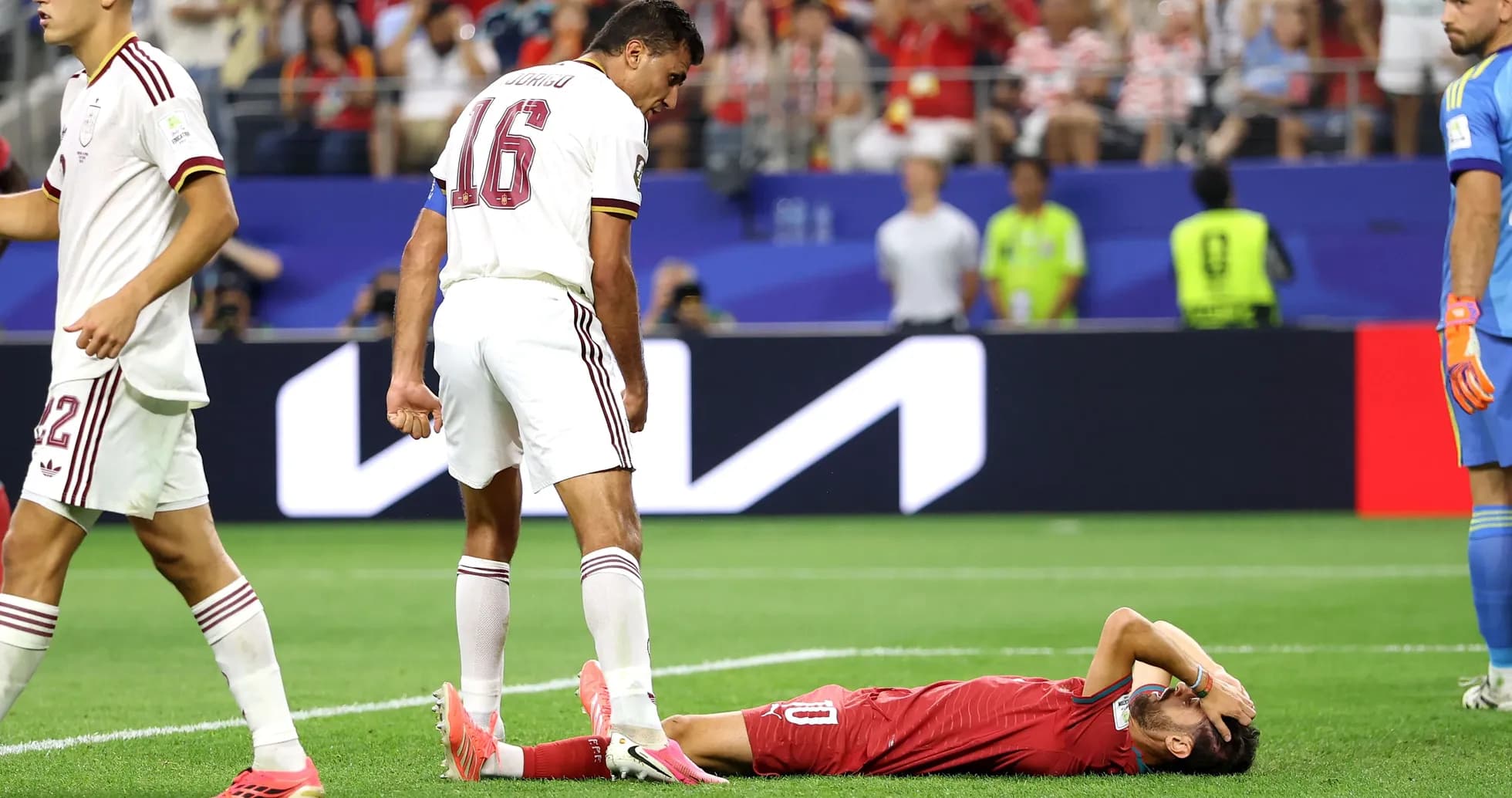 Player lying on the ground after a foul during match Player lying on the ground after a foul during match