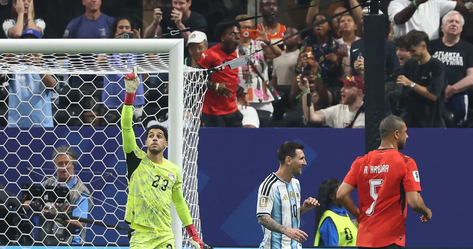 Goalkeeper celebrating with Messi and teammates during match Goalkeeper celebrating with Messi and teammates during match