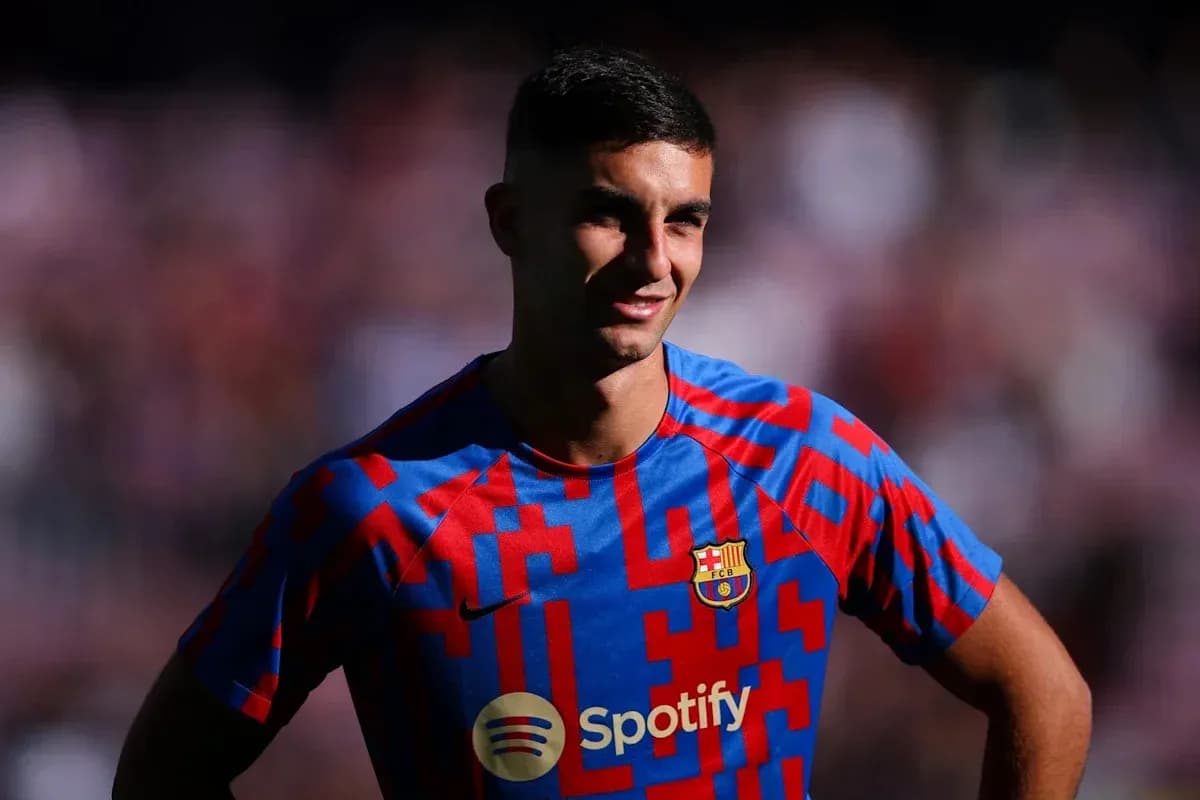 Football player in Barcelona jersey smiling Football player in Barcelona jersey smiling