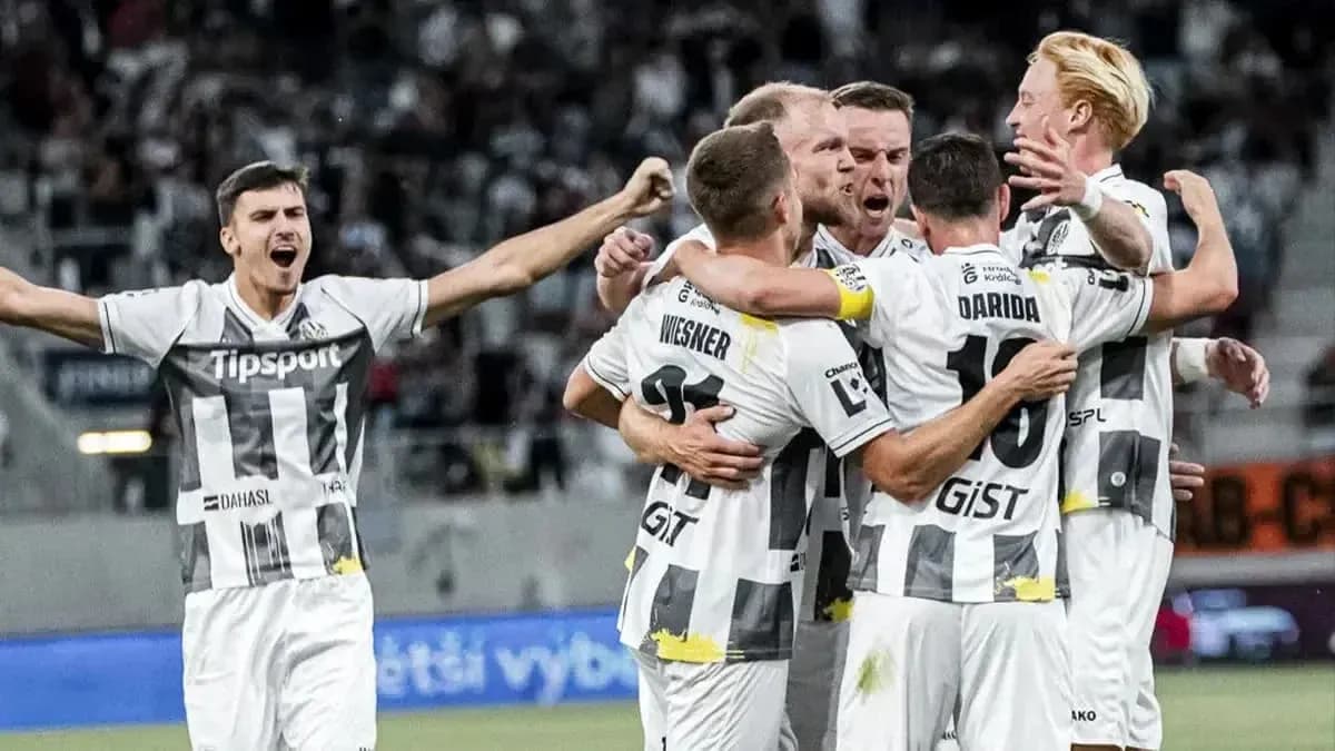Players celebrating a goal during UEFA match Players celebrating a goal during UEFA match
