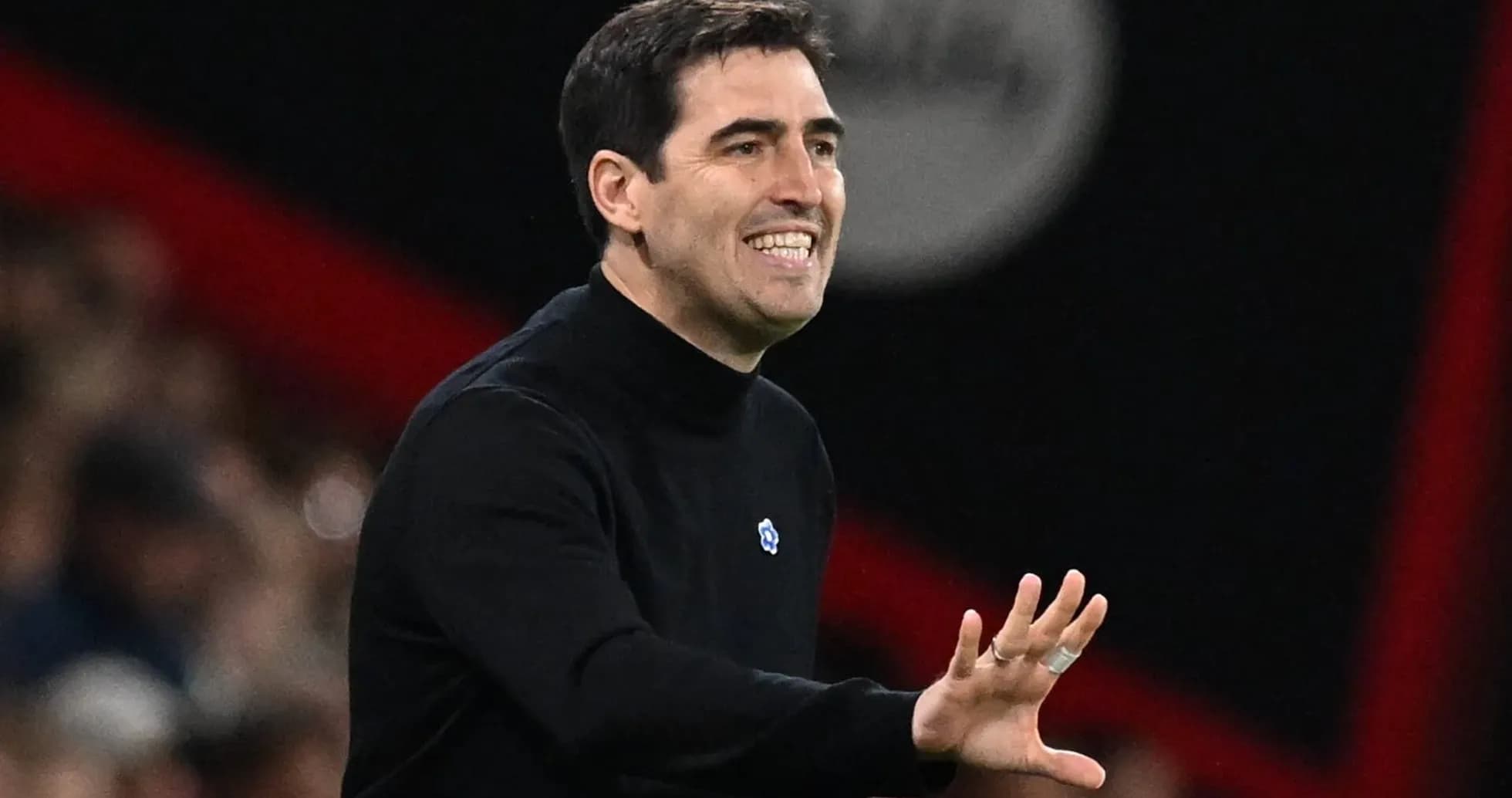 Coach gesturing during a match on the sidelines Coach gesturing during a match on the sidelines