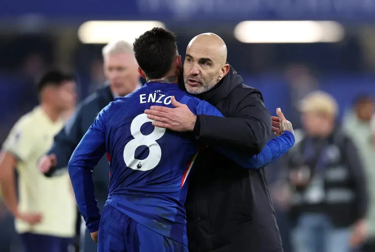 Player and coach embracing after the match Player and coach embracing after the match