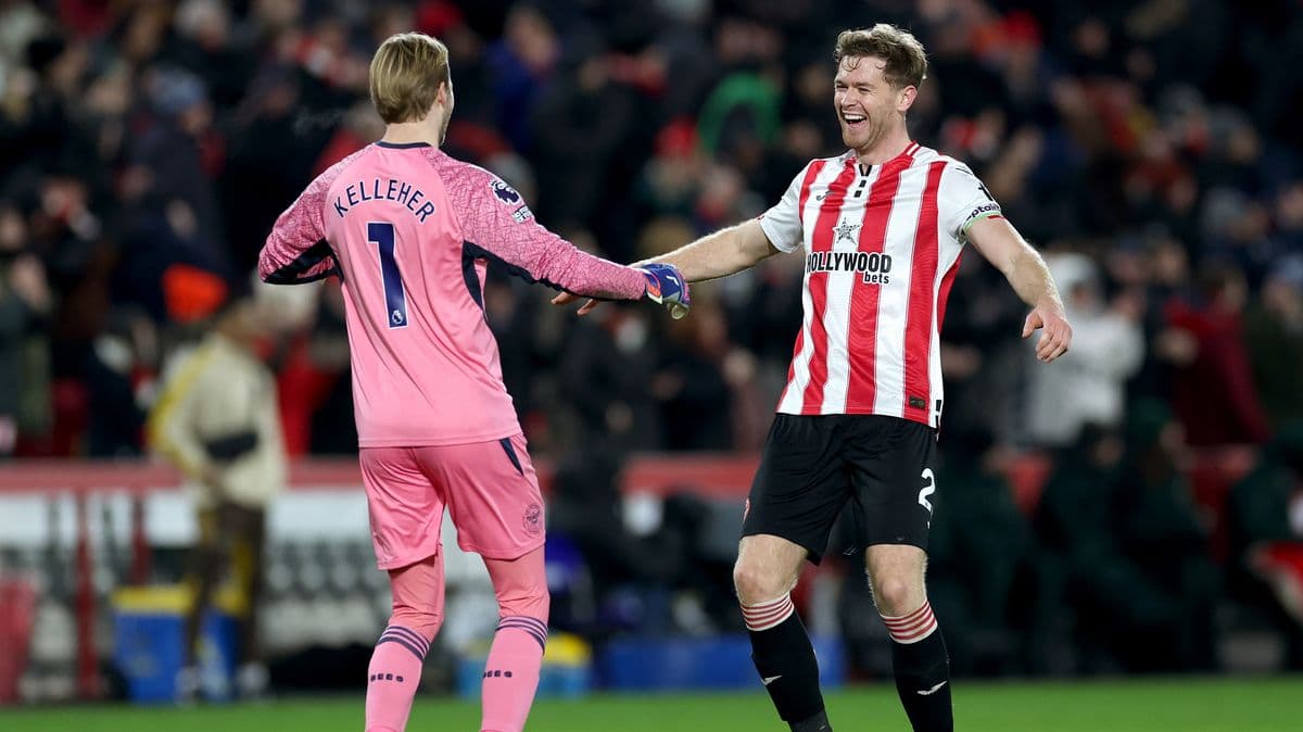 Two players celebrating after a match handshake Two players celebrating after a match handshake
