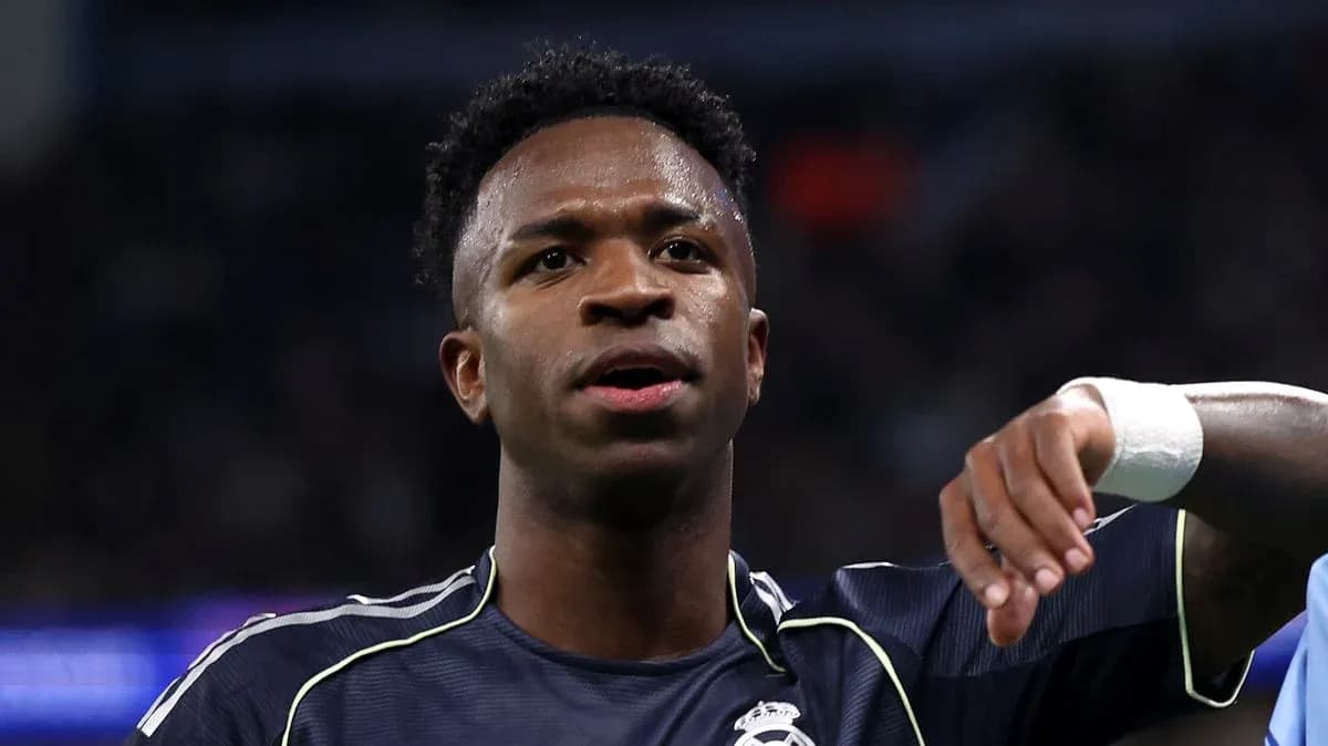 Player gesturing during a football match Player gesturing during a football match