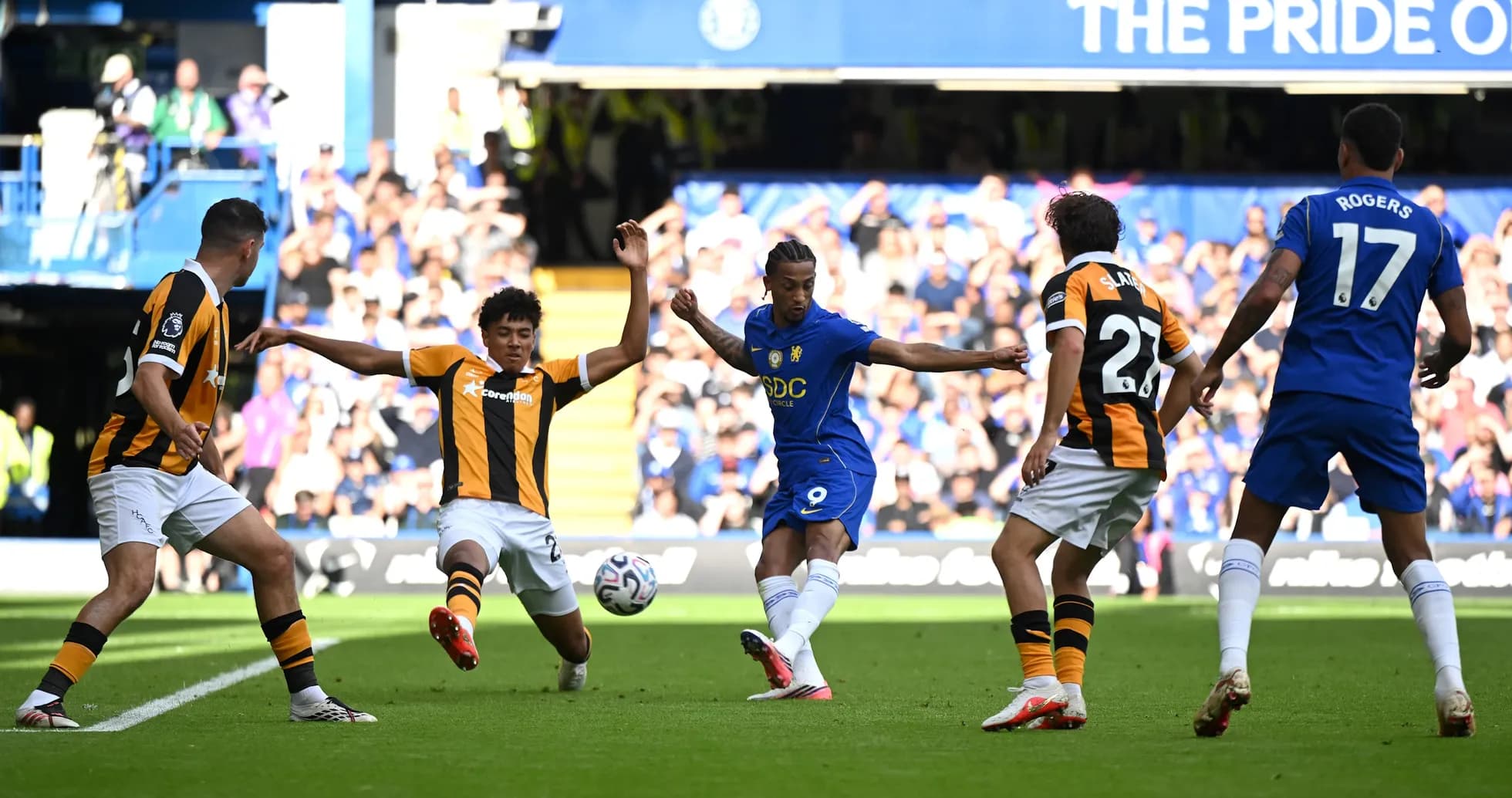 Chelsea player striking the ball against Hull City Chelsea player striking the ball against Hull City