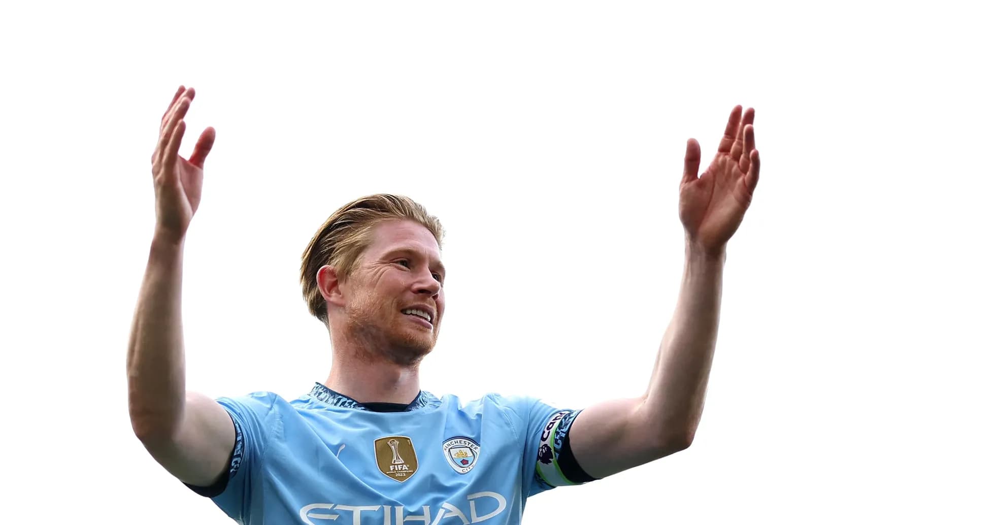 Player celebrating with arms raised in stadium Player celebrating with arms raised in stadium
