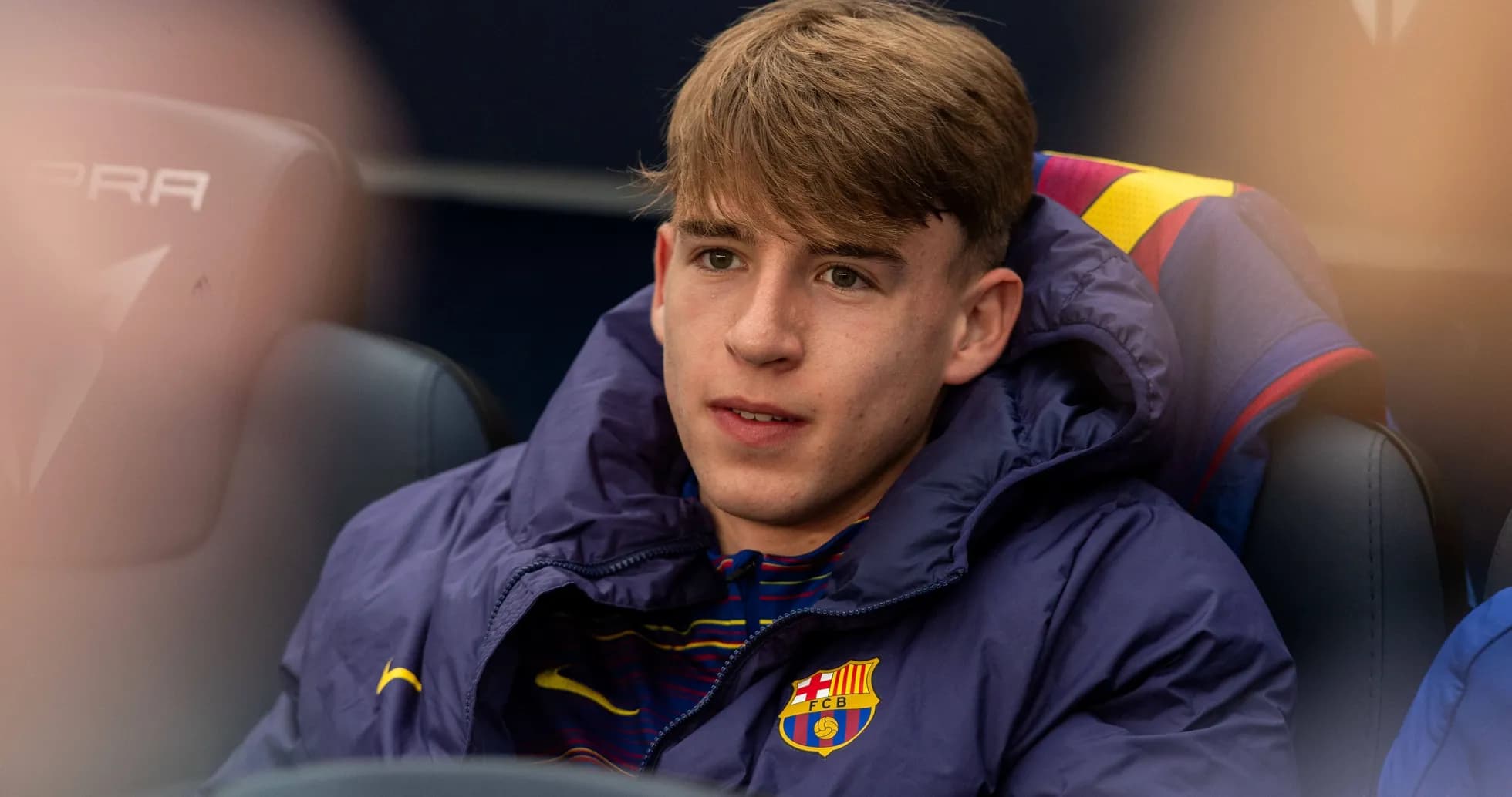 Barcelona player sitting on bench during match Barcelona player sitting on bench during match