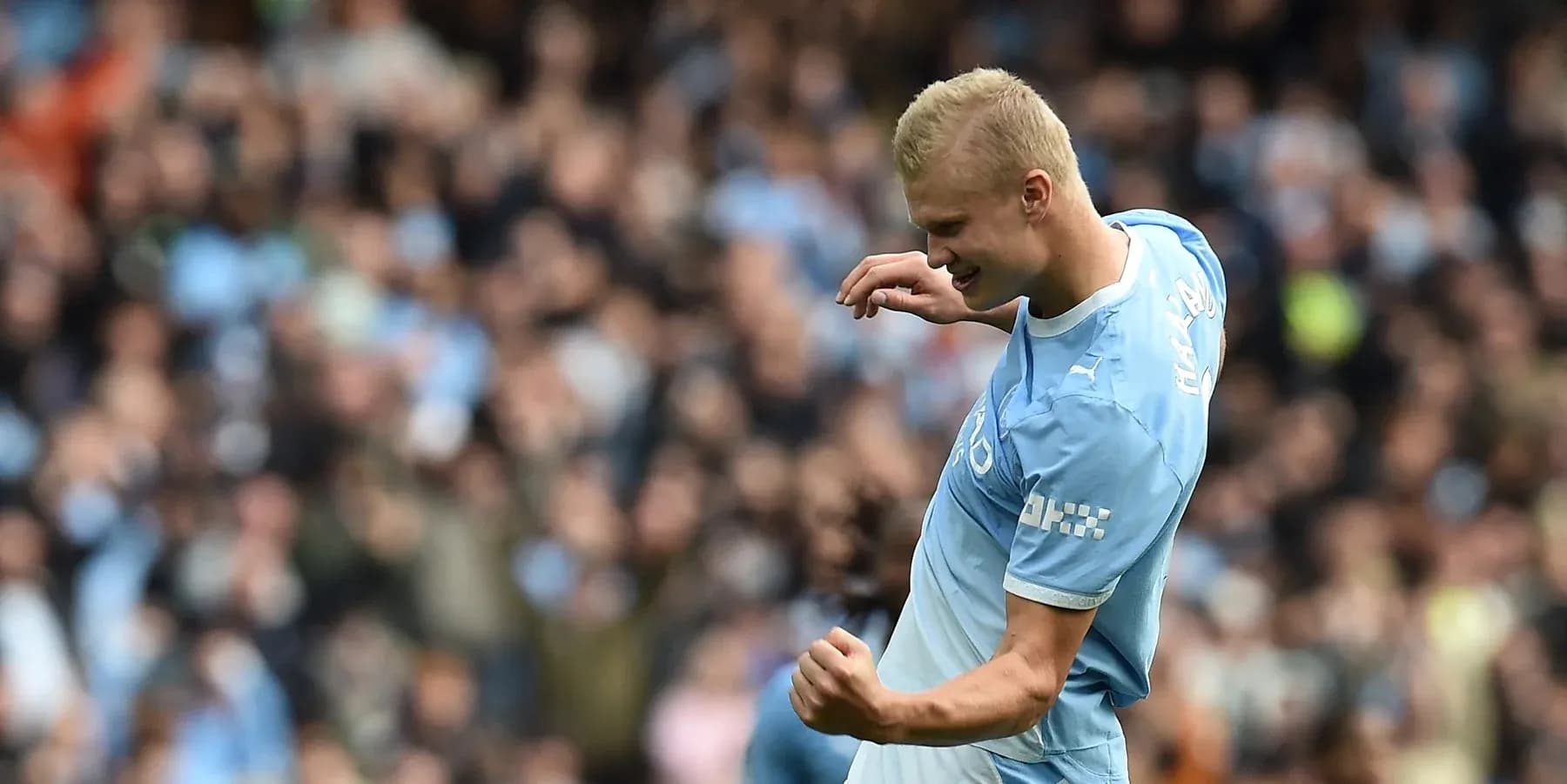 Player celebrating after scoring a goal Player celebrating after scoring a goal