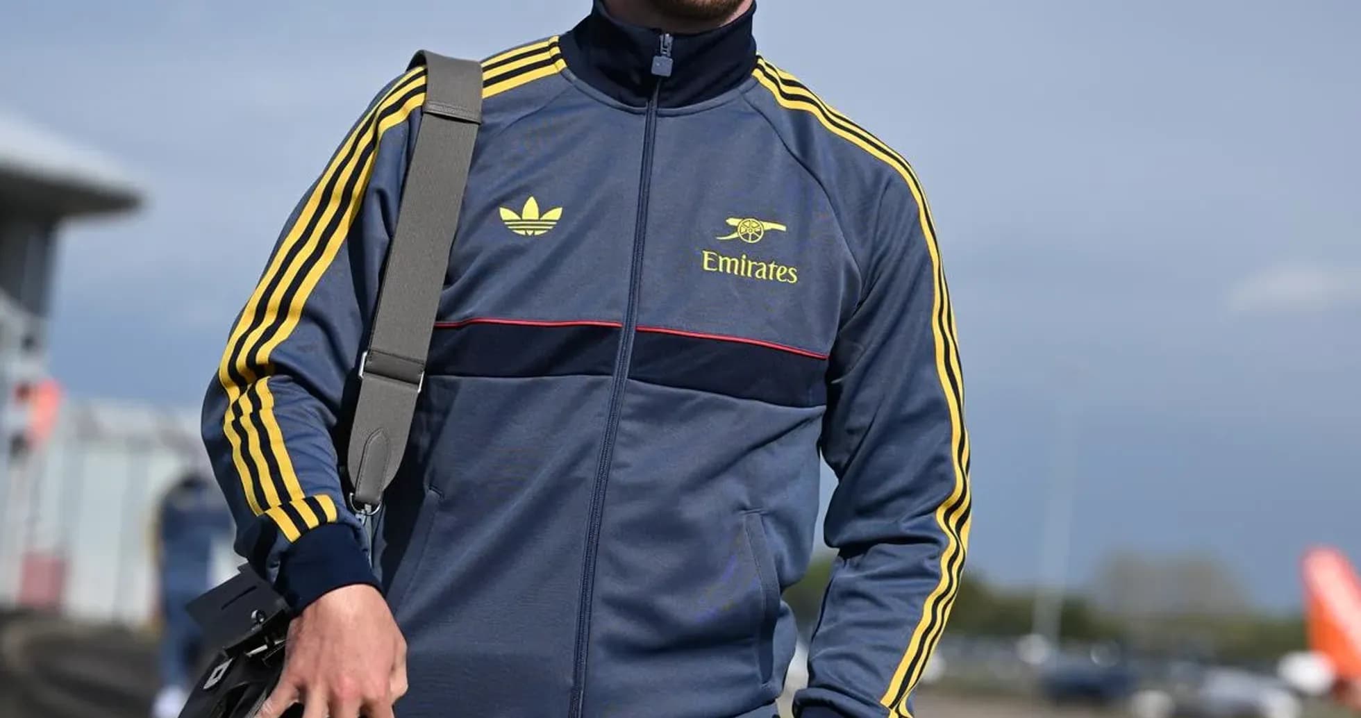 Man in sportswear walking with bag Man in sportswear walking with bag