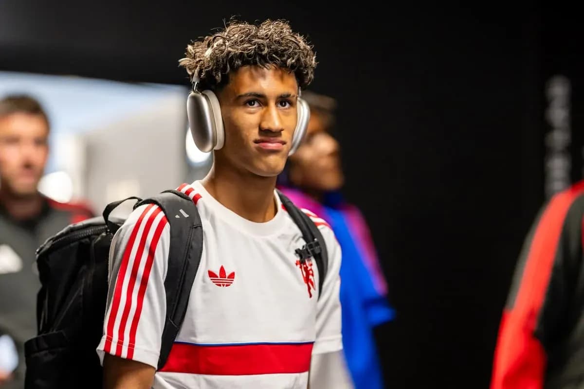 Player wearing headphones entering locker room Player wearing headphones entering locker room
