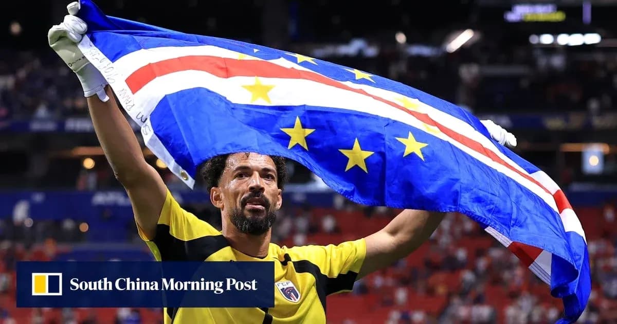 Player celebrating with Cape Verde flag after match Player celebrating with Cape Verde flag after match