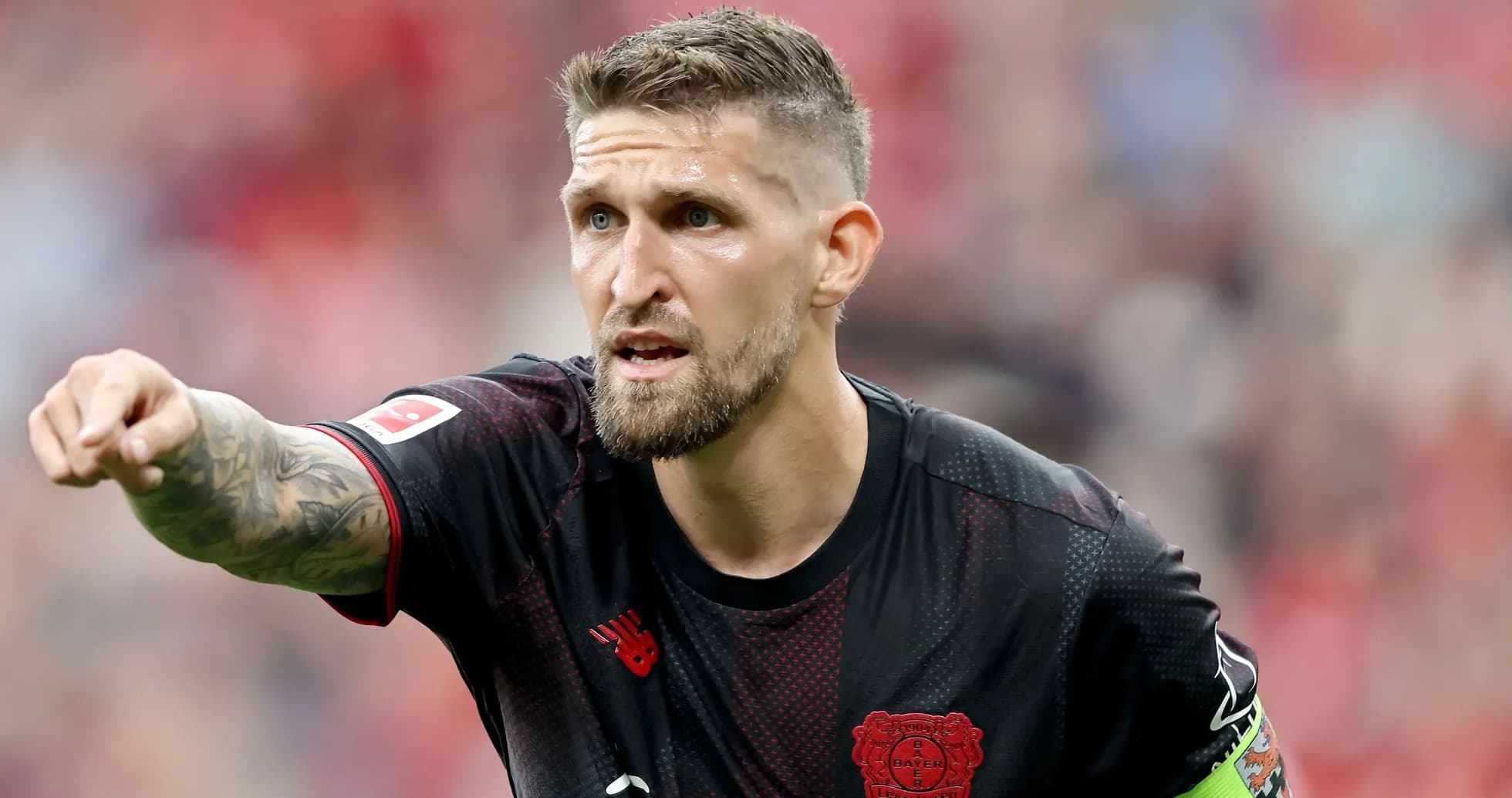 Player pointing during match wearing Bayer Leverkusen kit Player pointing during match wearing Bayer Leverkusen kit