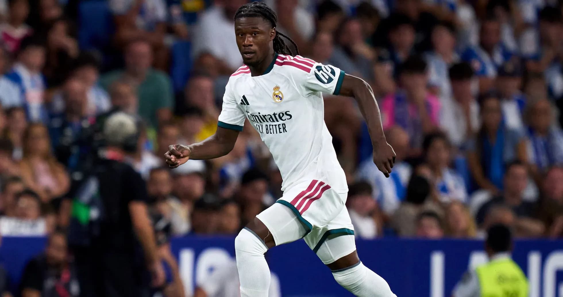 Real Madrid player running during a match Real Madrid player running during a match