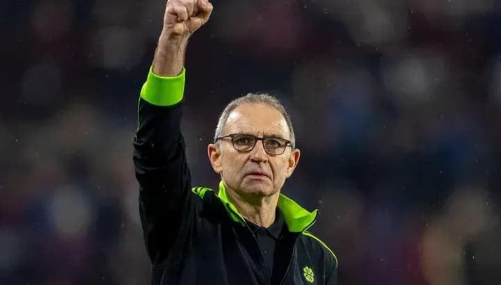 Coach raising fist in celebration during match Coach raising fist in celebration during match