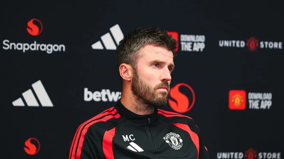 Manchester United coach at press conference podium Manchester United coach at press conference podium