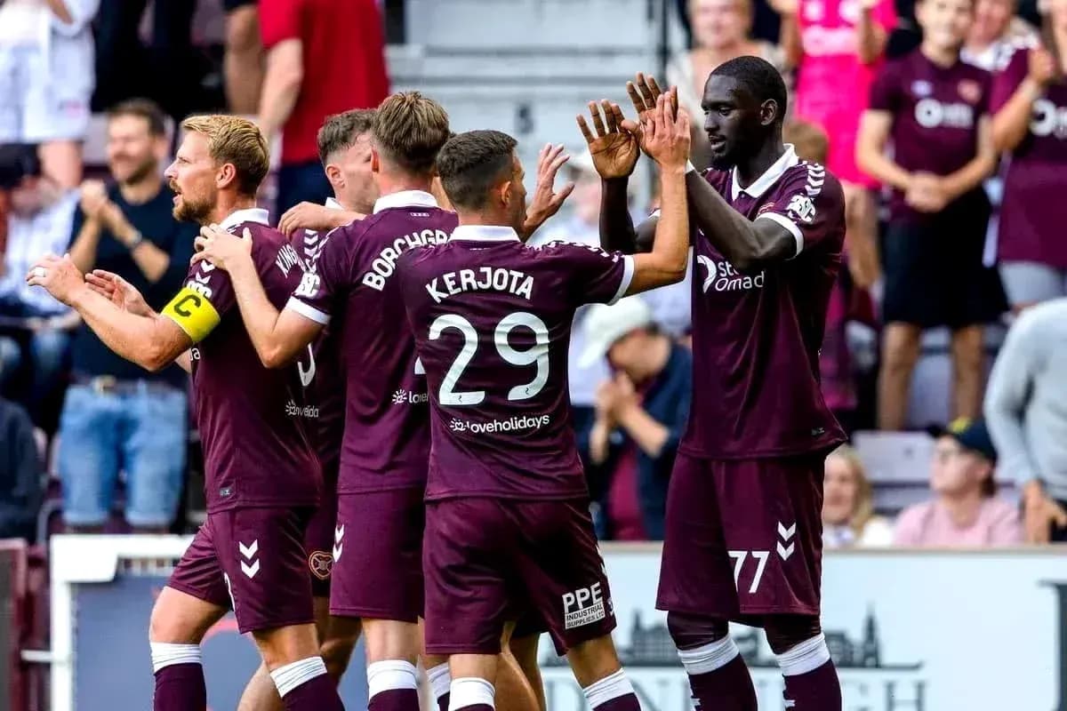 Hearts players celebrating during a match Hearts players celebrating during a match