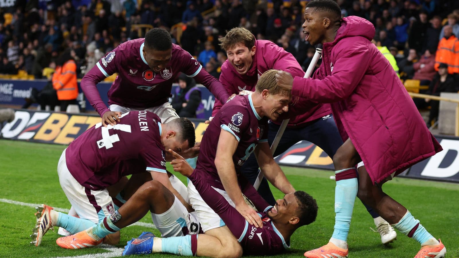 Burnley players celebrating a goal during match Burnley players celebrating a goal during match