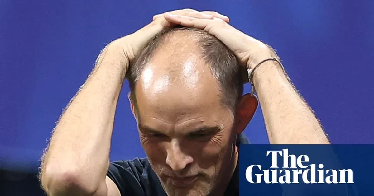 Coach holding his head in frustration during match Coach holding his head in frustration during match
