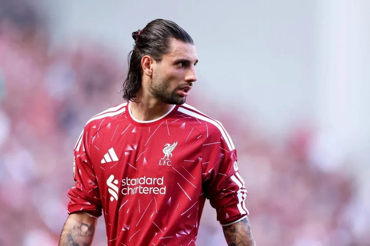 Goalkeeper in Liverpool jersey on the field Goalkeeper in Liverpool jersey on the field