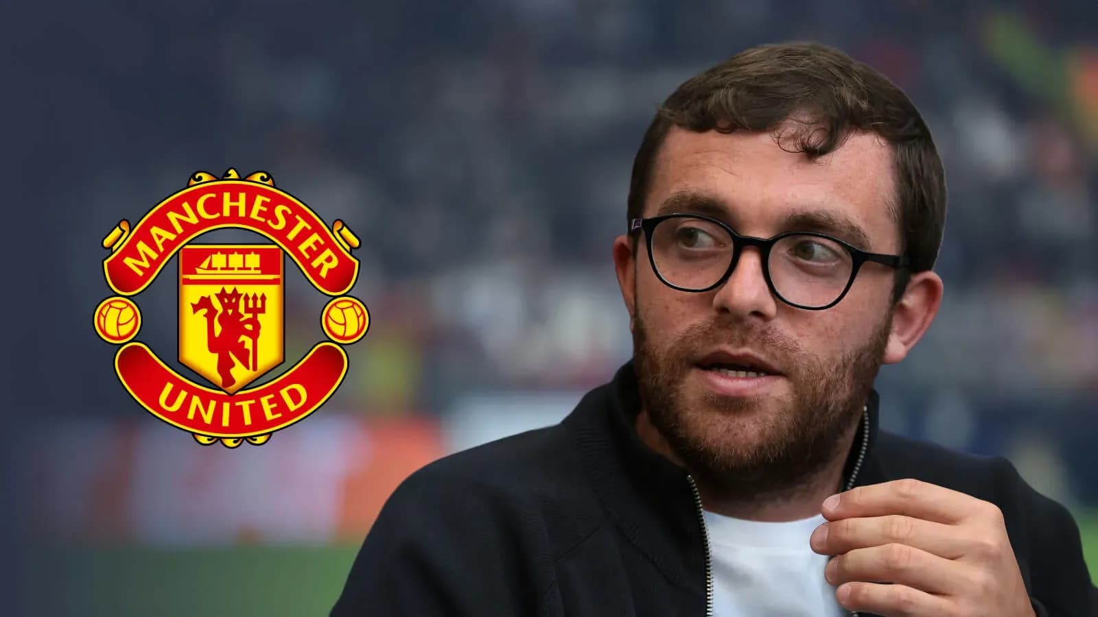 Man speaking with Manchester United logo in background Man speaking with Manchester United logo in background