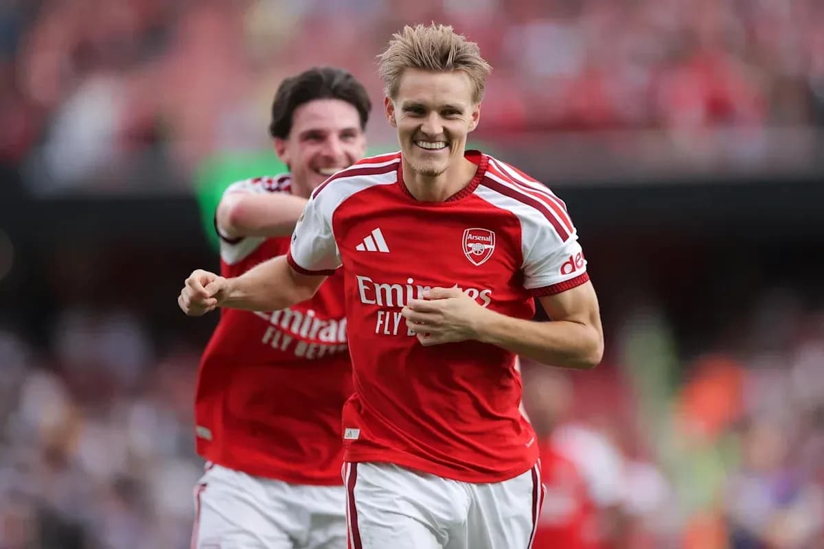 Arsenal players celebrating a goal during match Arsenal players celebrating a goal during match