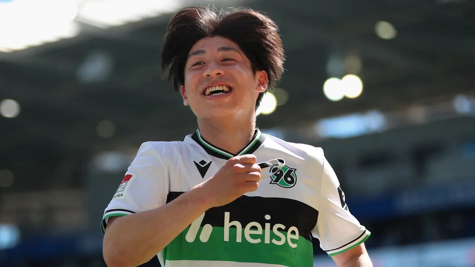 Player celebrating a goal on the field Player celebrating a goal on the field