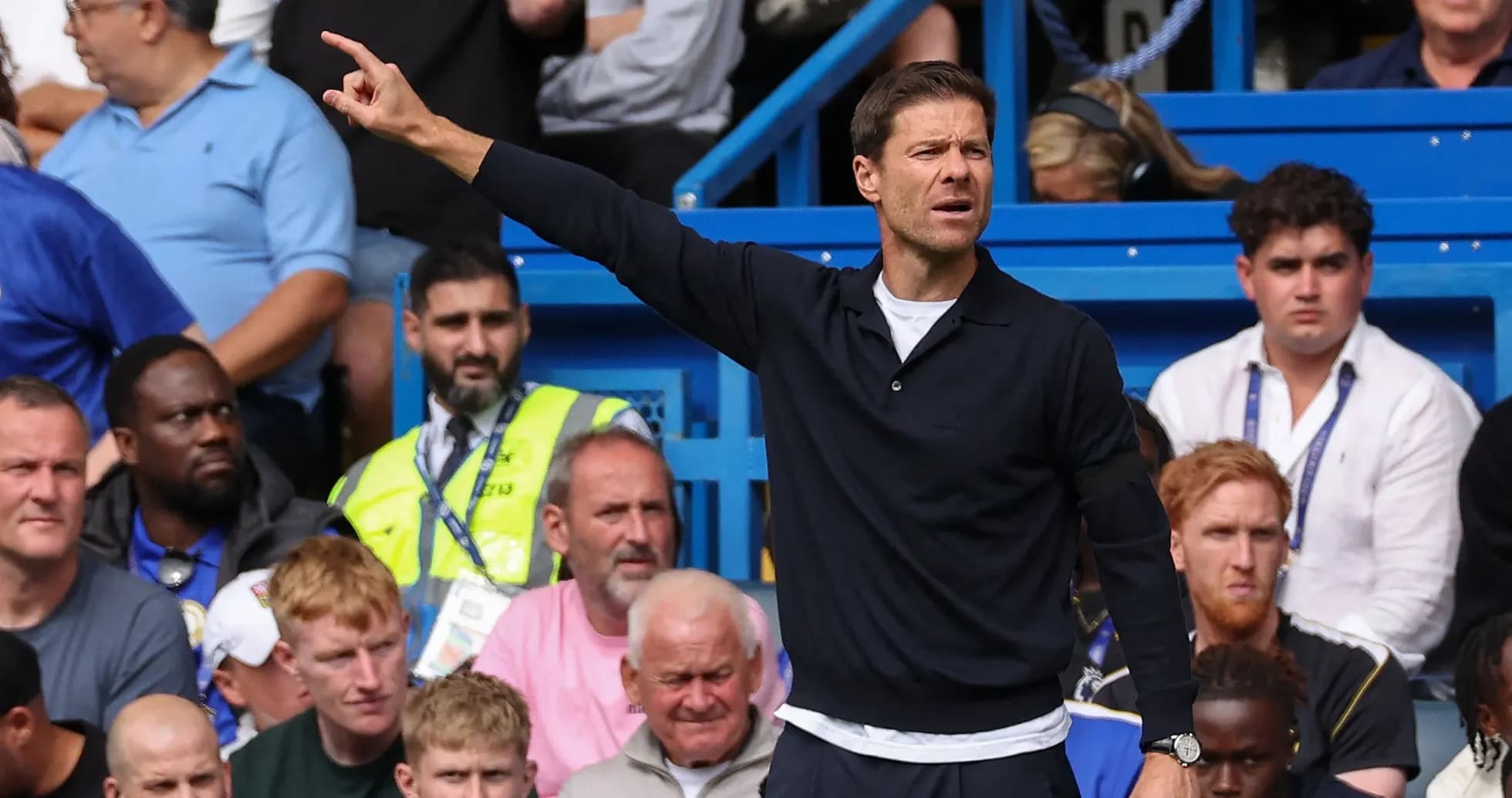 Coach gesturing from the sidelines during match Coach gesturing from the sidelines during match