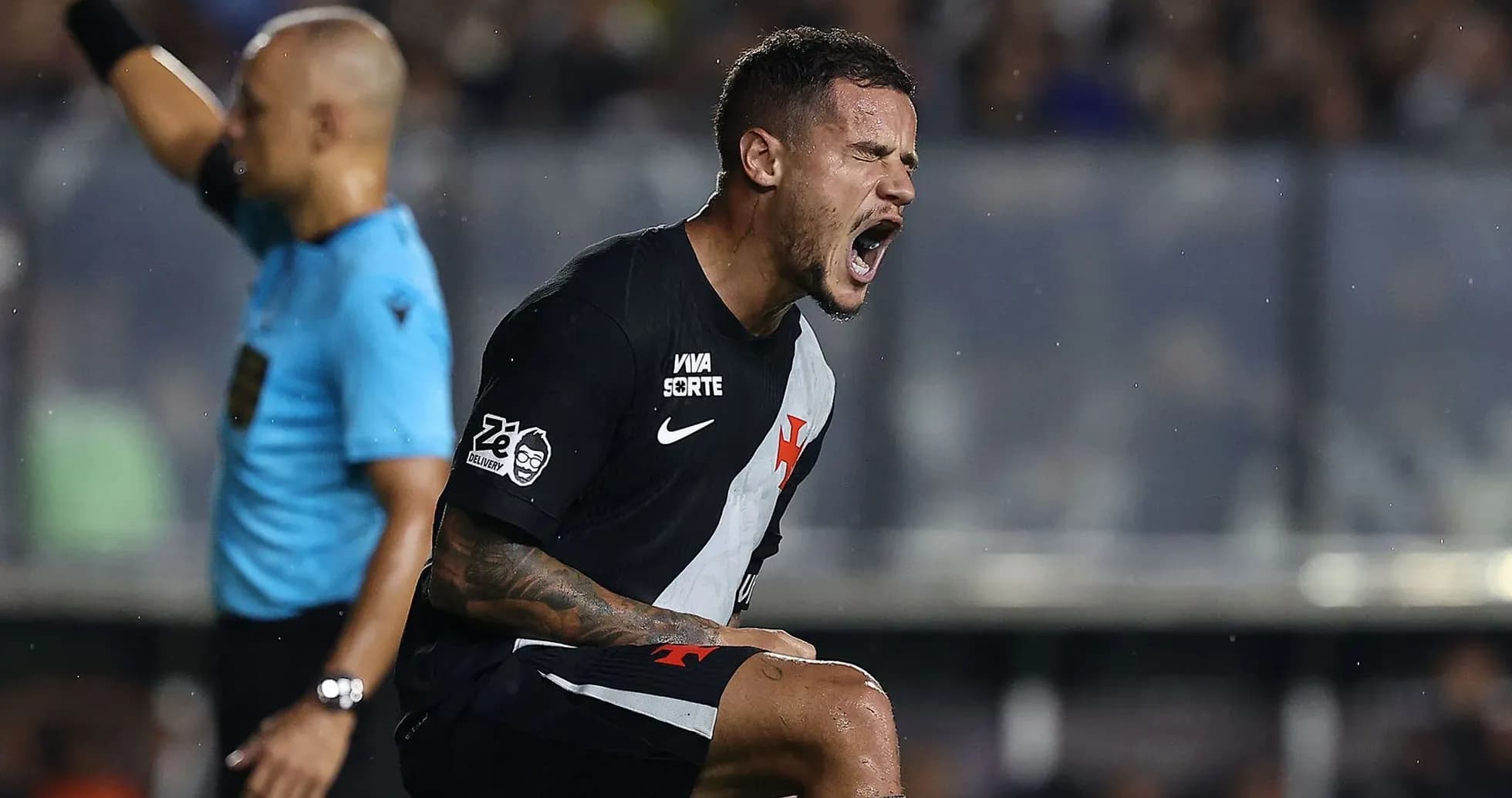 Player celebrating passionately during a football match Player celebrating passionately during a football match