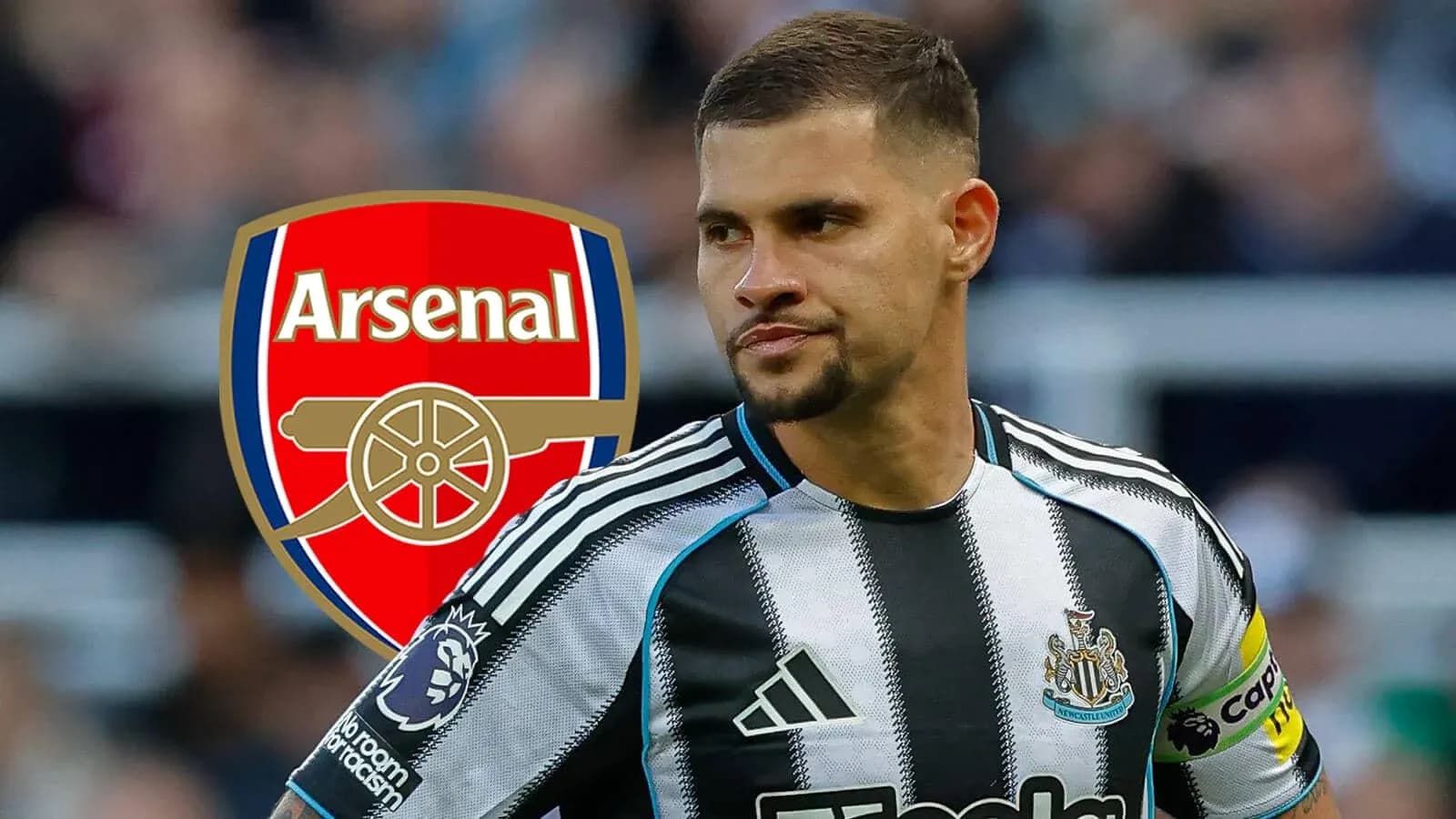 Newcastle player with Arsenal logo in background Newcastle player with Arsenal logo in background