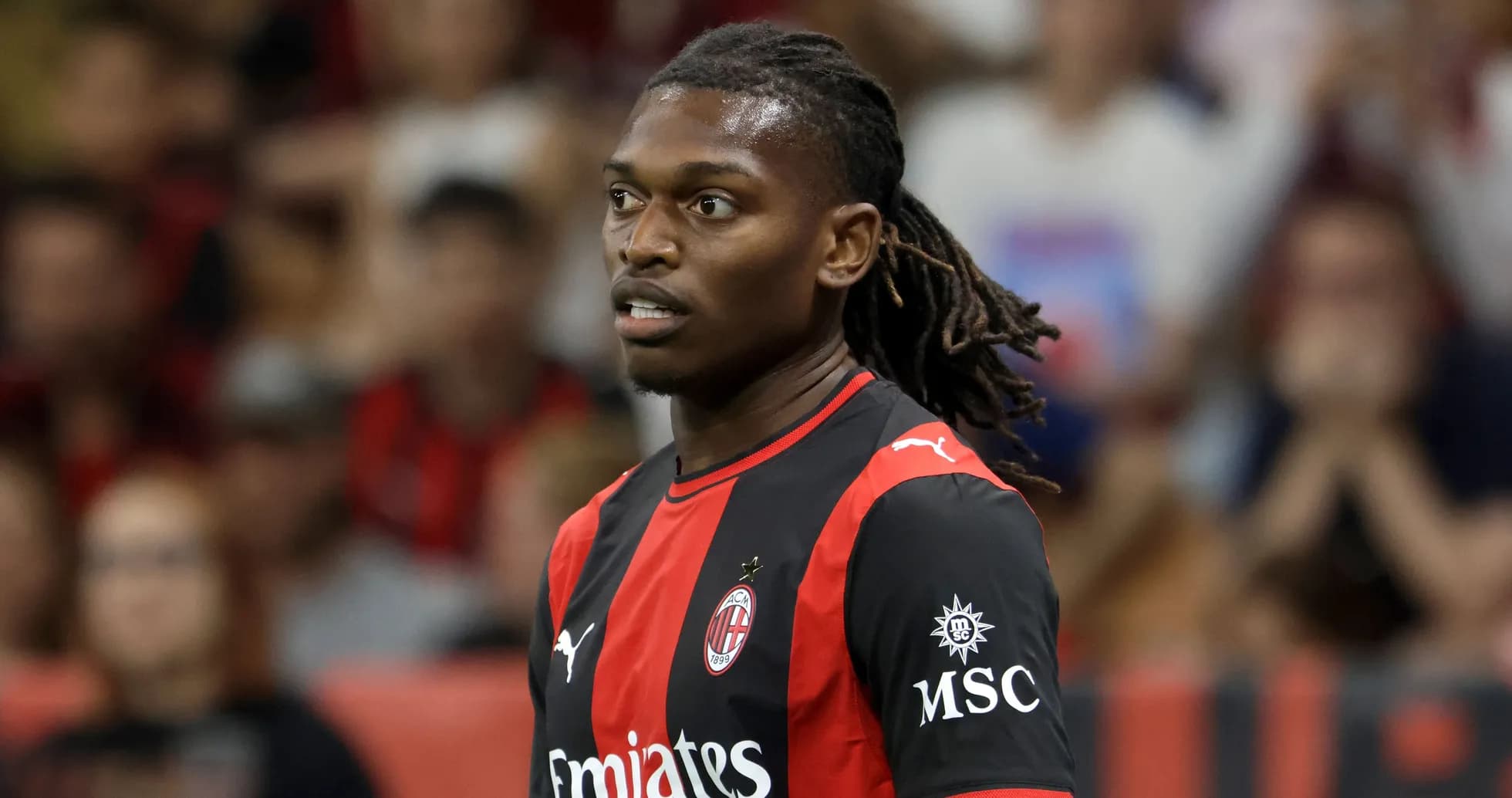 Player in AC Milan jersey during a match Player in AC Milan jersey during a match