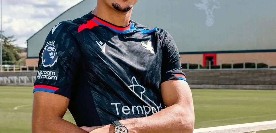 Player posing in Crystal Palace training kit outdoors Player posing in Crystal Palace training kit outdoors