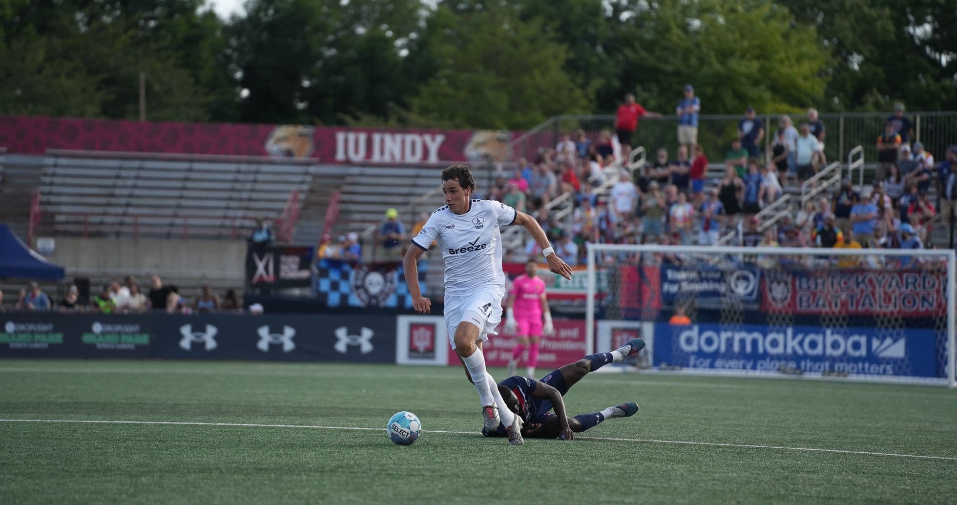 Player dribbling the ball during Indy Eleven match Player dribbling the ball during Indy Eleven match
