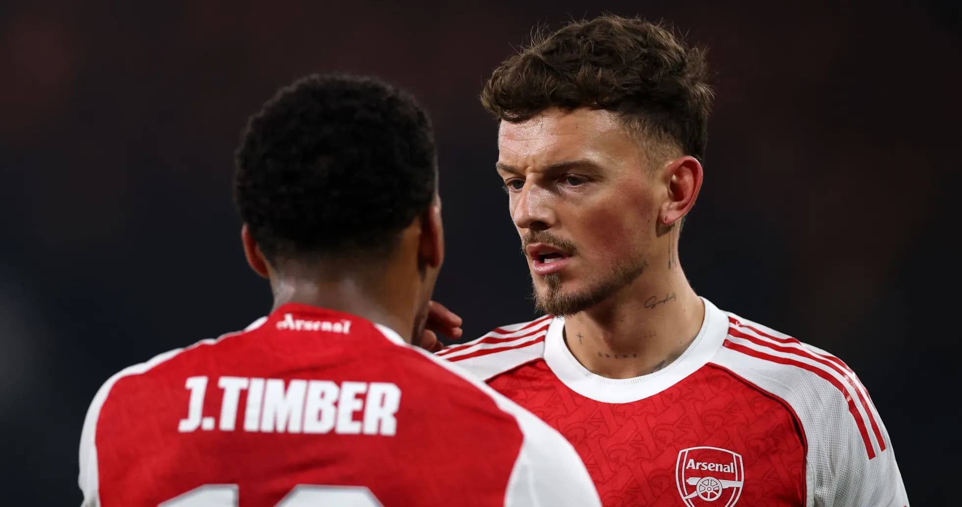 Two Arsenal players discussing during a match Two Arsenal players discussing during a match