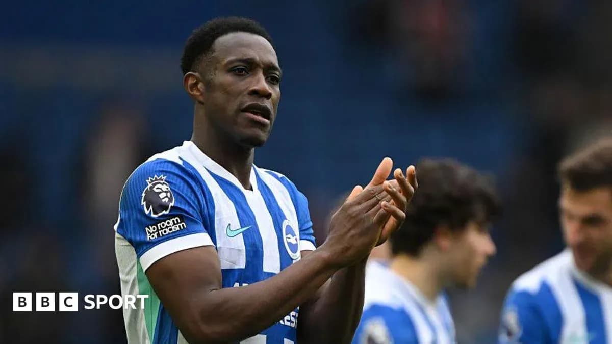 Player clapping in Brighton home kit after match Player clapping in Brighton home kit after match