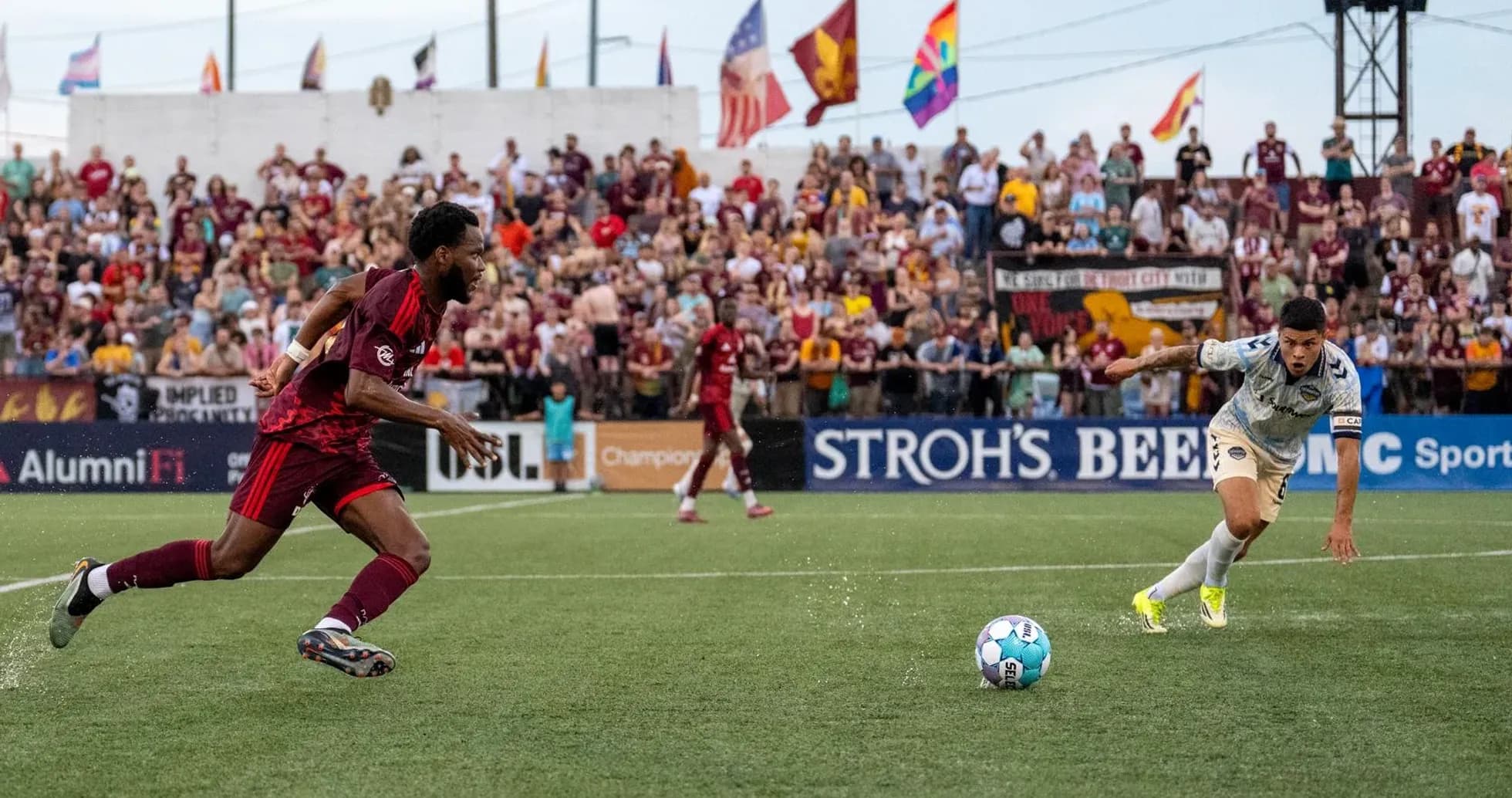 Players competing for the ball in USL match Players competing for the ball in USL match