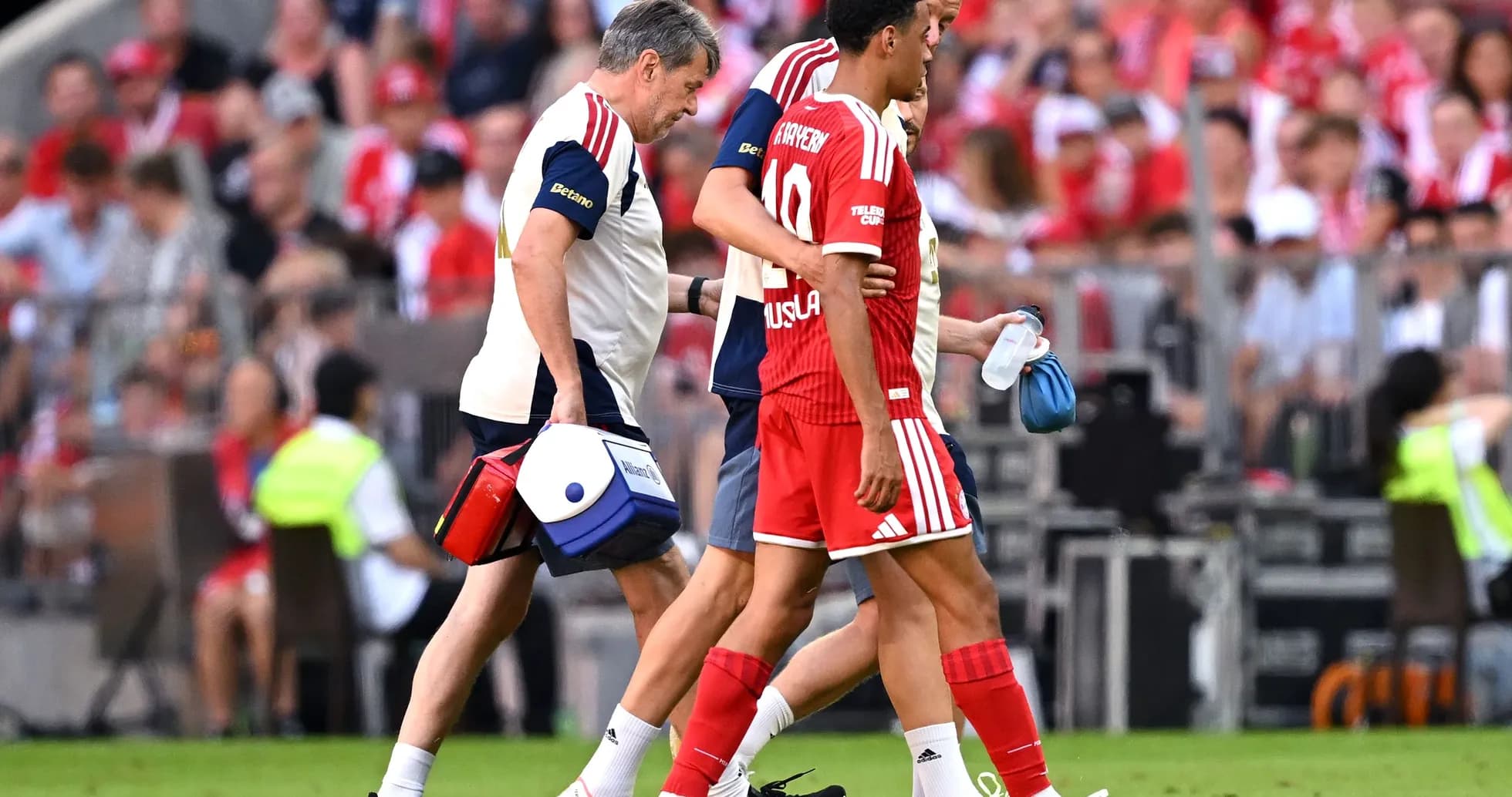 Player receiving medical attention during match Player receiving medical attention during match