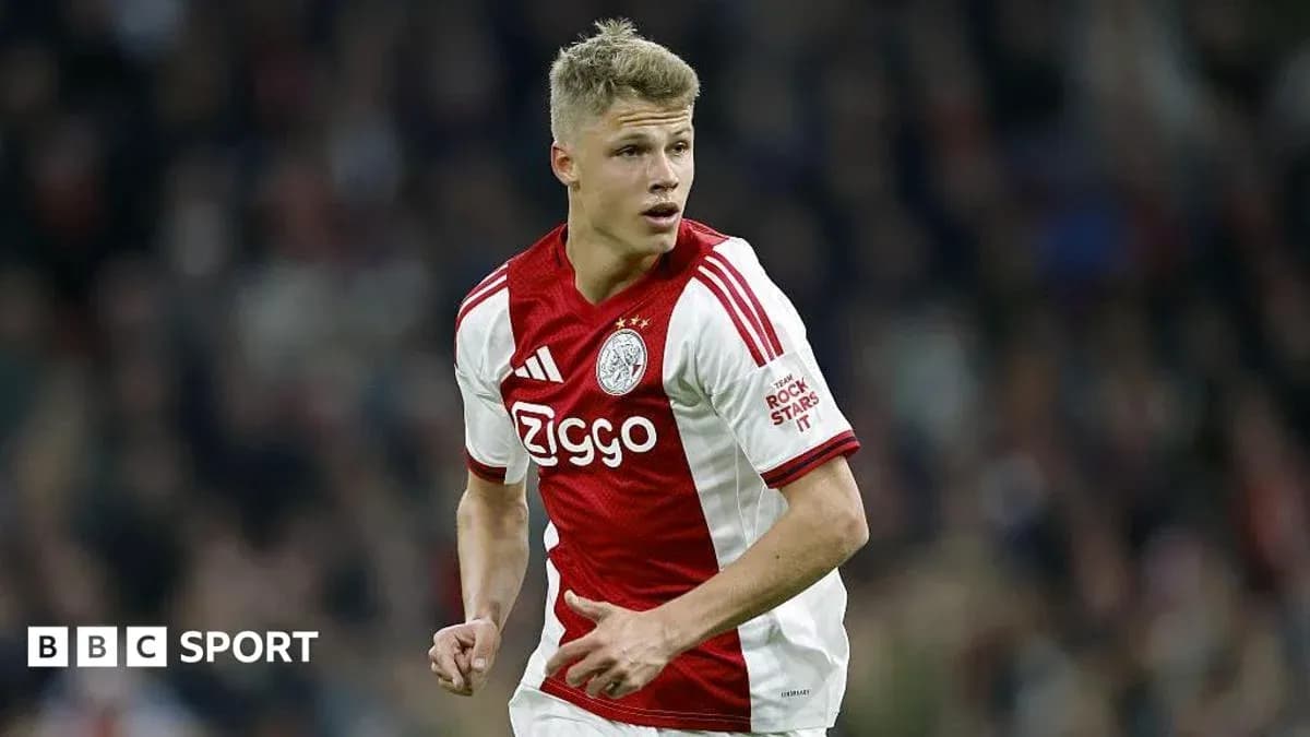 Ajax player running during a match Ajax player running during a match