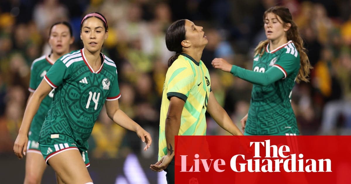 Players from Mexico and Australia during a match Players from Mexico and Australia during a match