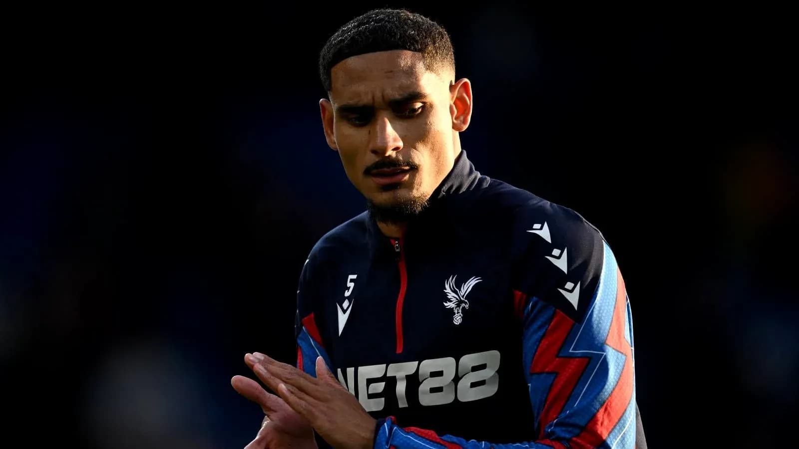 Player in Crystal Palace kit during match preparation Player in Crystal Palace kit during match preparation