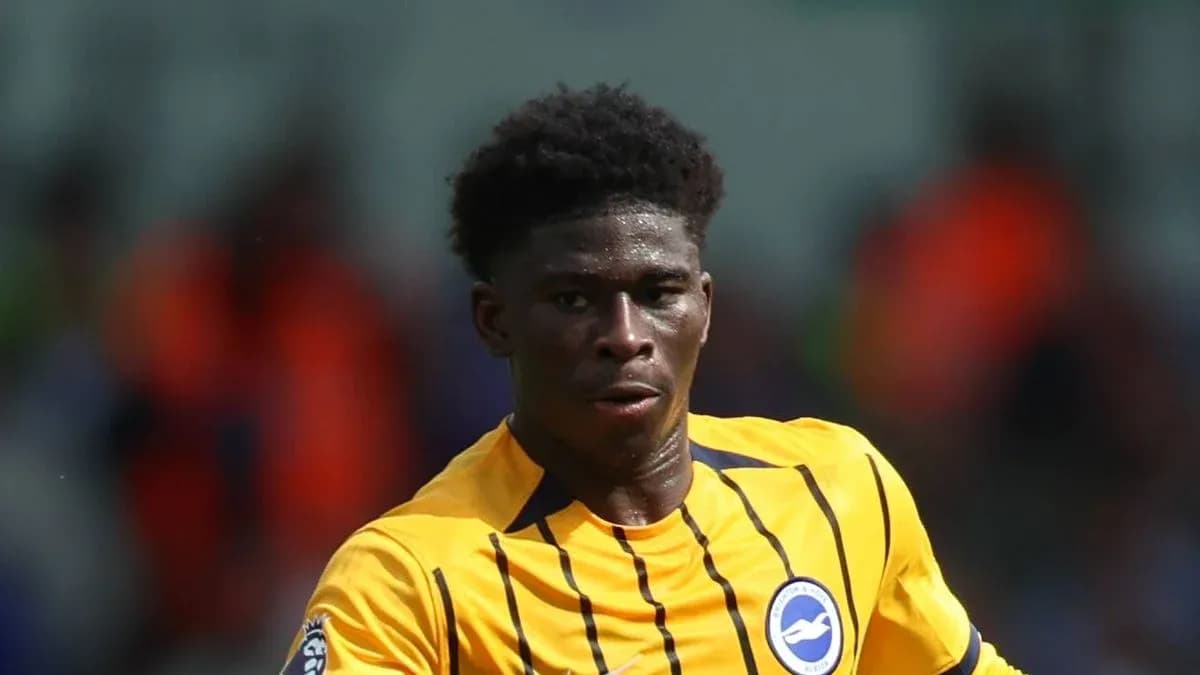 Player in yellow kit running during match Player in yellow kit running during match