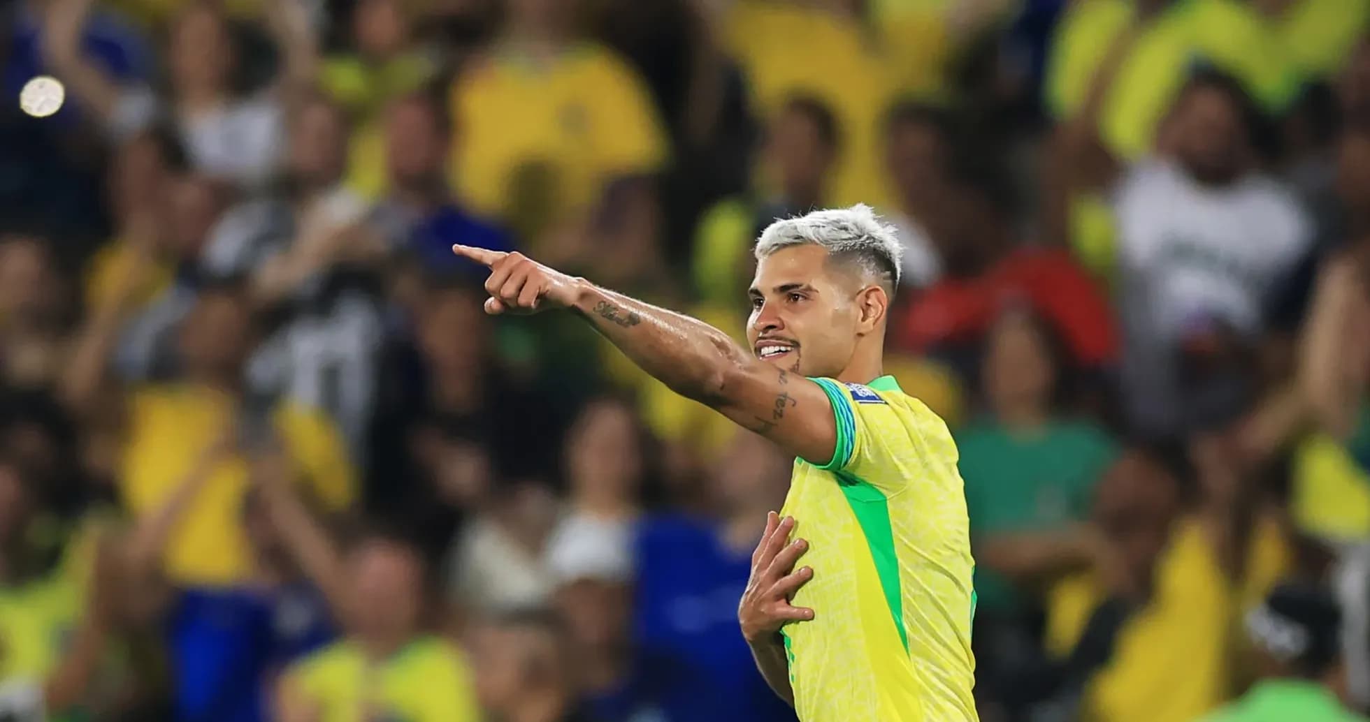 Player celebrating and pointing to the crowd Player celebrating and pointing to the crowd