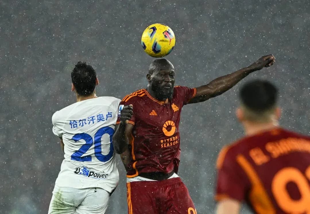 Player heading the ball during AS Roma match Player heading the ball during AS Roma match