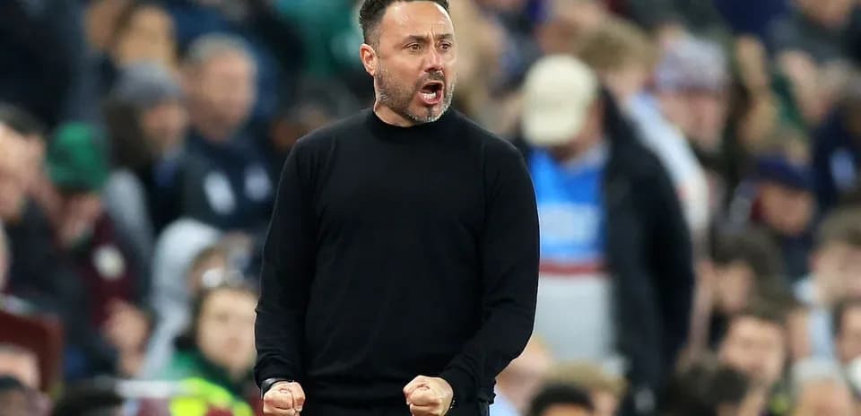 Coach celebrating passionately on the sidelines Coach celebrating passionately on the sidelines