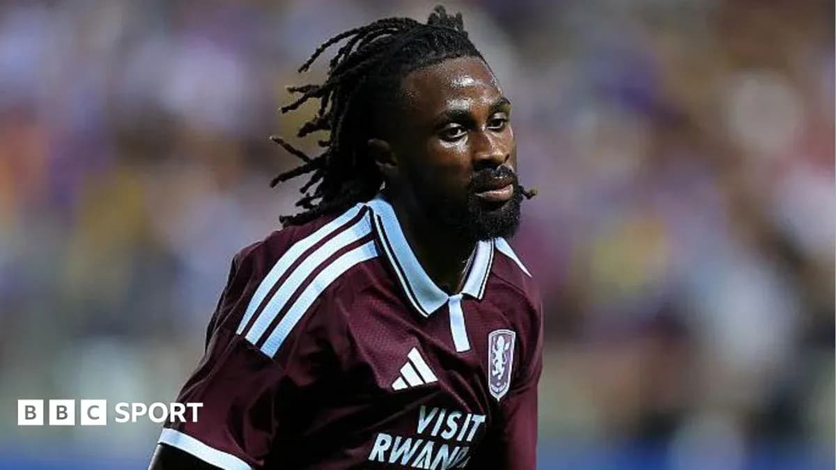 Player in maroon jersey running during match Player in maroon jersey running during match