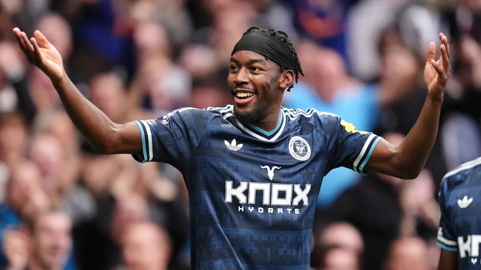 Player celebrating a goal during a match Player celebrating a goal during a match