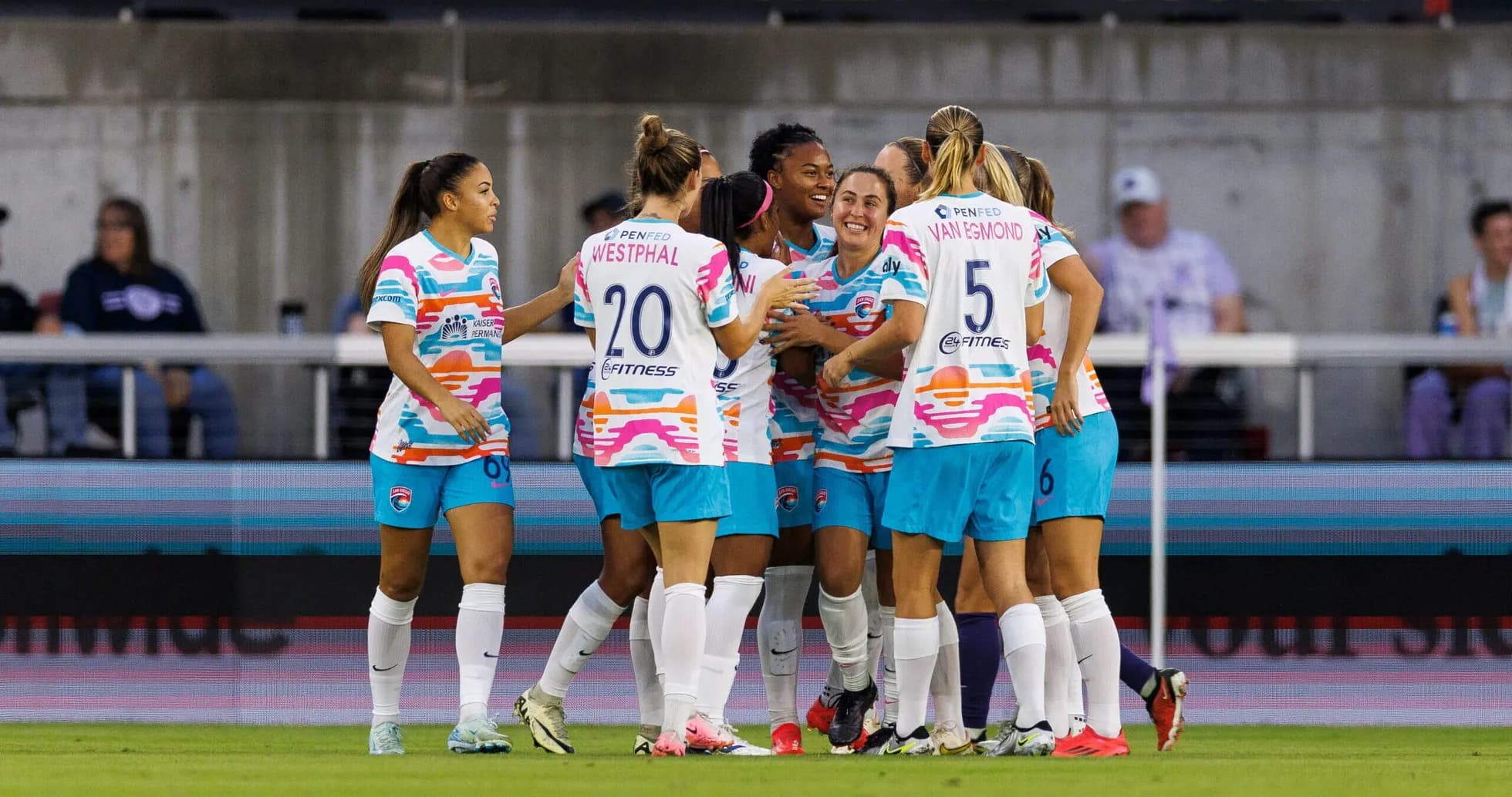 Players celebrating a goal during NWSL match Players celebrating a goal during NWSL match