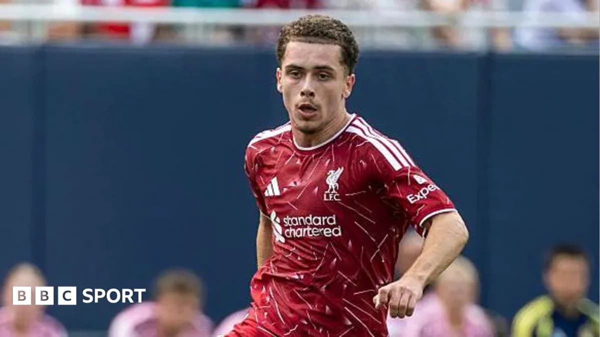 Player running during Liverpool FC training session Player running during Liverpool FC training session