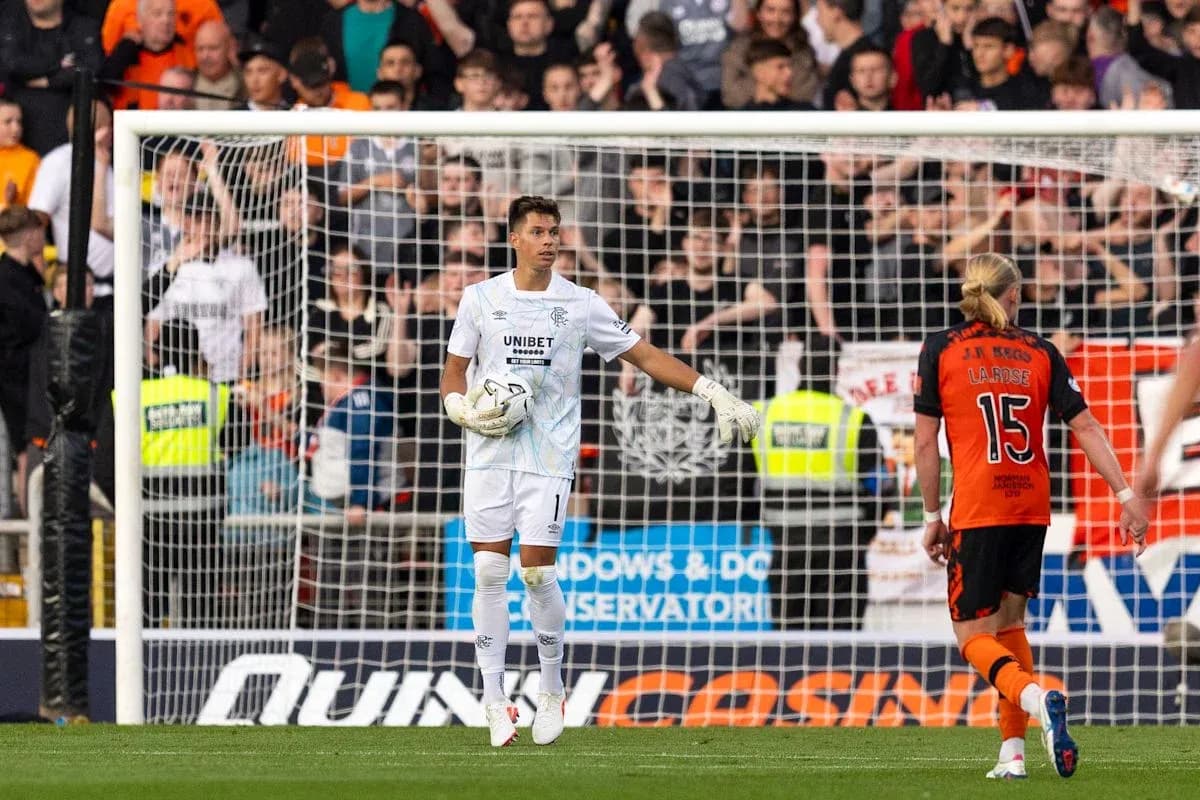 Goalkeeper standing in front of the goal during match Goalkeeper standing in front of the goal during match