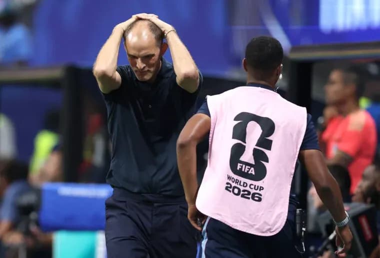 Coach with hands on head during tense moment Coach with hands on head during tense moment
