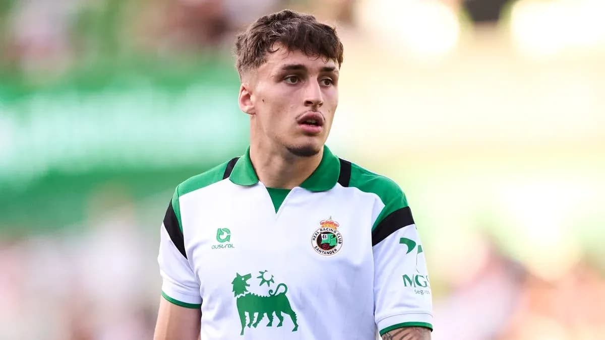 Player in white and green jersey during match Player in white and green jersey during match